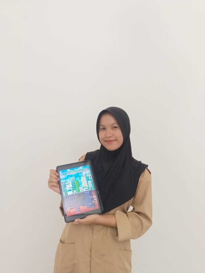 
 Foto : Siswi Man 1 Lotim Haifa Atsil (XL) sukses menjadi juara Poster yang diselenggarakan Fakultas Tehnik Unram